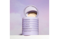 Image Subtl's stacked makeup product in front of a purple background.
